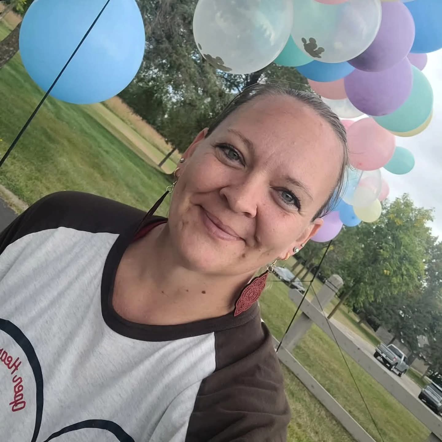 image of woman with balloons